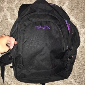 Black Dakine backpack